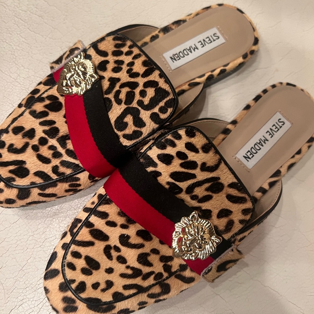 Leopard (real cow hide fur) print slides by Steve Madden. . Excellent condition